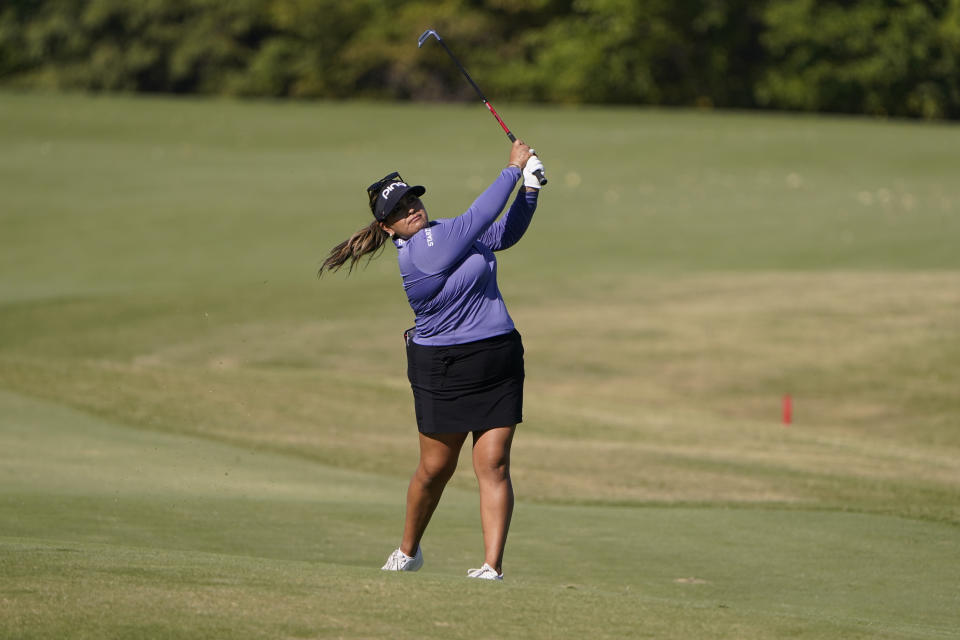 Lizette Salas watches her approach shot an the 13th hole during the LPGA The Ascendant golf tournament in The Colony, Texas, Thursday, Sept. 29, 2022. (AP Photo/LM Otero)