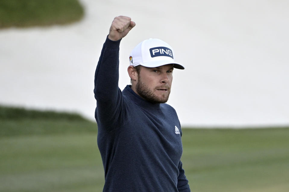 Tyrrell Hatton, of England, celebrates after sinking a putt for birdie on the 18th green to take the lead during the third round of the Arnold Palmer Invitational golf tournament, Saturday, March 7, 2020, in Orlando, Fla. (AP Photo/Phelan M. Ebenhack)