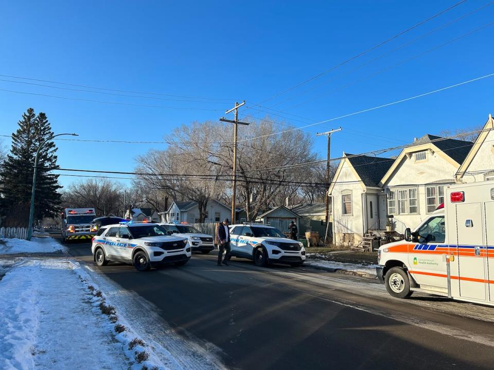 Regina police officers were searching garbage bins in the area of 15th Avenue and Wallace Street on Sunday afternoon.