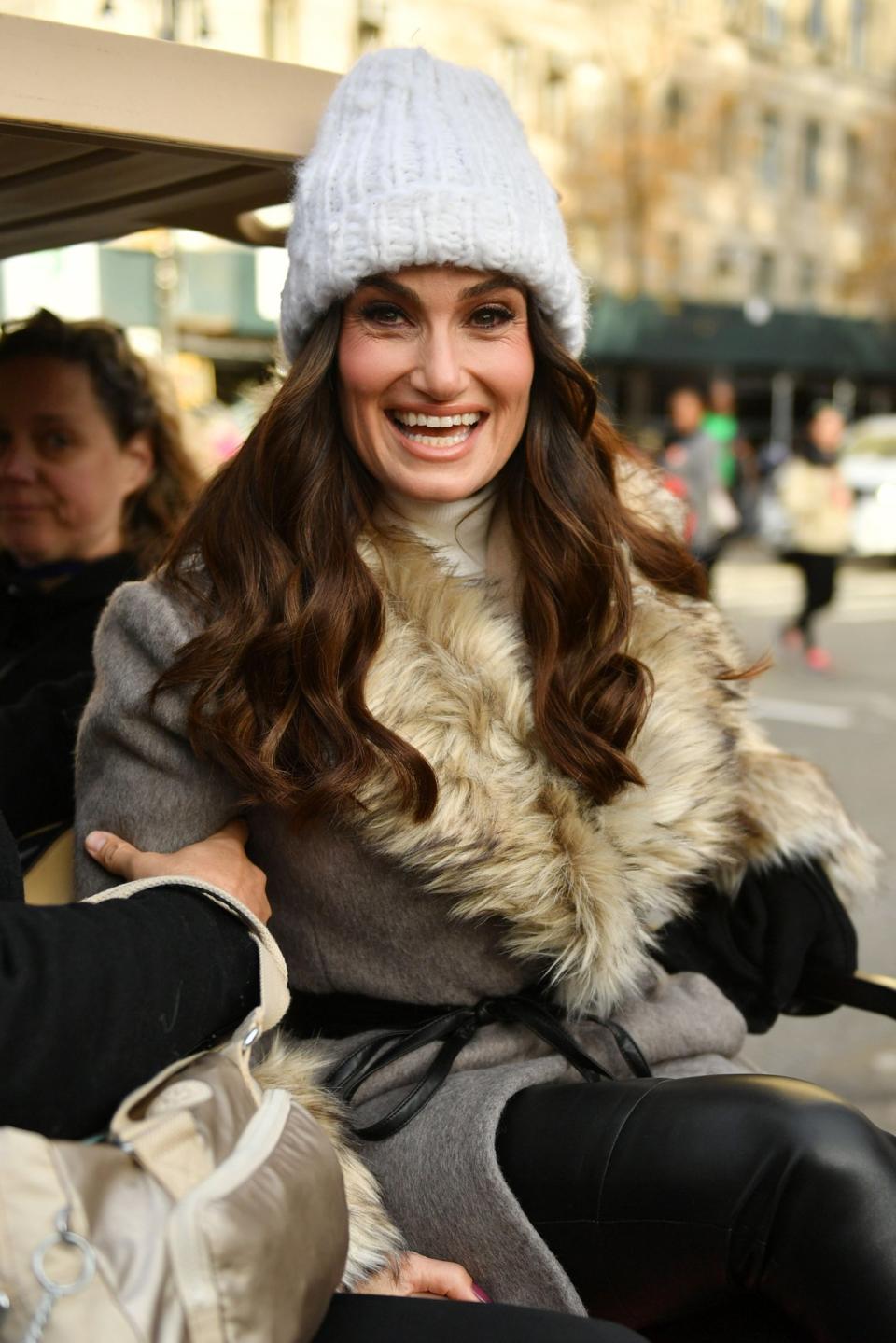 Idina Menzel was all smiles on the Deck the Halls float.