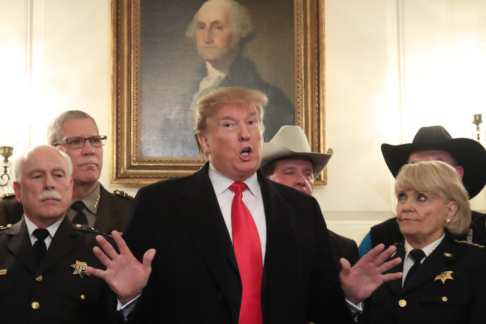 President Donald Trump speaks during a meeting with a group of sheriffs from around the country before leaving the White House in Washington, Monday, Feb. 11, 2019, for a trip to El Paso, Texas. Trump will hold his first campaign rally since November's midterm elections in El Paso,, as he faces a defining week for his push on the wall — and for his presidency and his 2020 prospects. (AP Photo/Manuel Balce Ceneta)