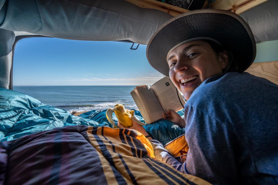 Katie reading in the van in Mexico