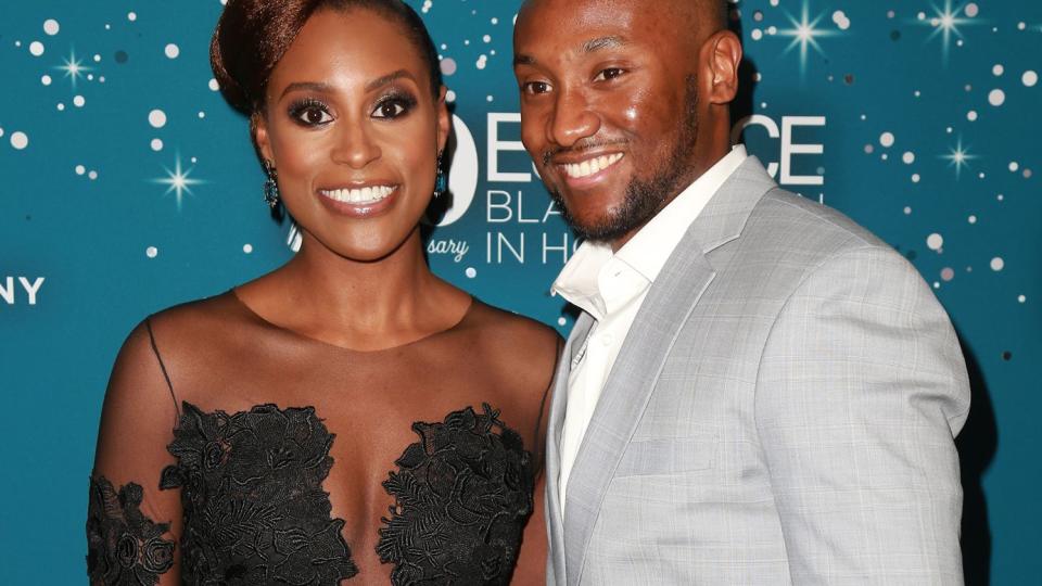 Issa Rae (L) and Louis Diame at Essence Black Women in Hollywood Awards at the Beverly Wilshire Four Seasons Hotel on February 23, 2017 in Beverly Hills, California