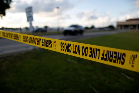 Police tape is seen near the site of the shooting at the Santa Fe High School, in Santa Fe, Texas, U.S., May 19, 2018. REUTERS/Jonathan Bachman