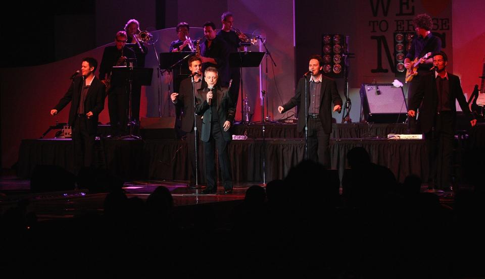 Frankie Valli and the Four Seasons performing
