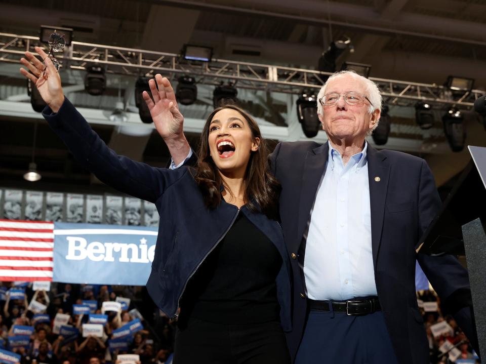 To the left: Alexandria Ocasio-Cortez and Bernie SandersREUTERS