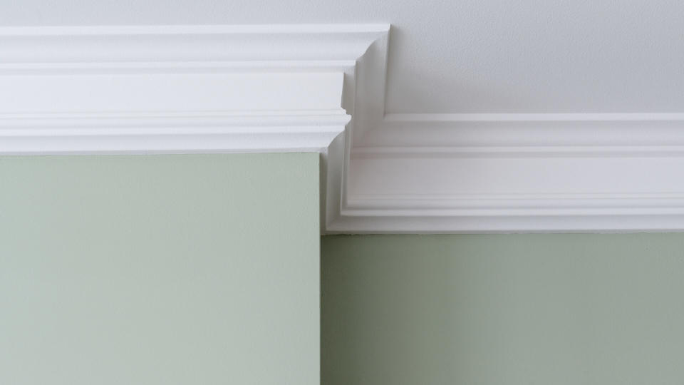 Ceiling moldings in the interior, a detail of intricate corner.