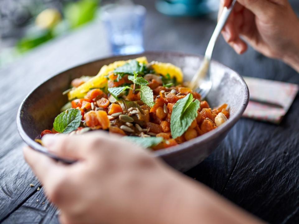 A person eats a vegetarian meal (Getty Images/iStockphoto)