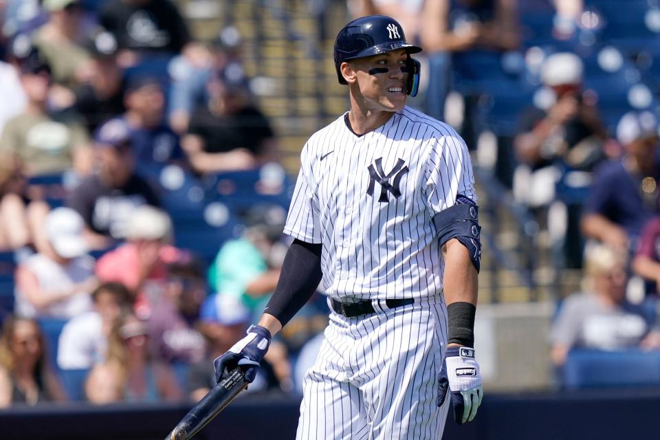 New York Yankees' Aaron Judge walks to the dugout after striking out during a spring training game against the Detroit Tigers, Sunday, March 20, 2022, in Tampa, Fla. (AP Photo/Lynne Sladky)