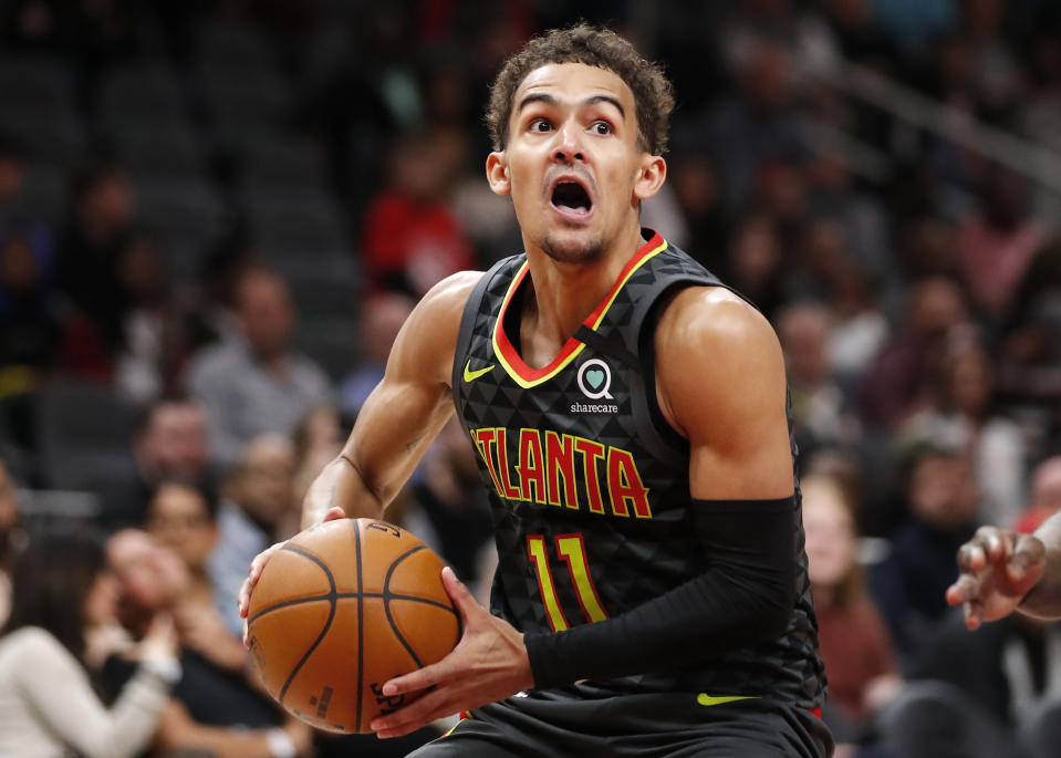 Trae Young is an offensive wunderkind, so what gives in Atlanta? (Todd Kirkland/Getty Images)