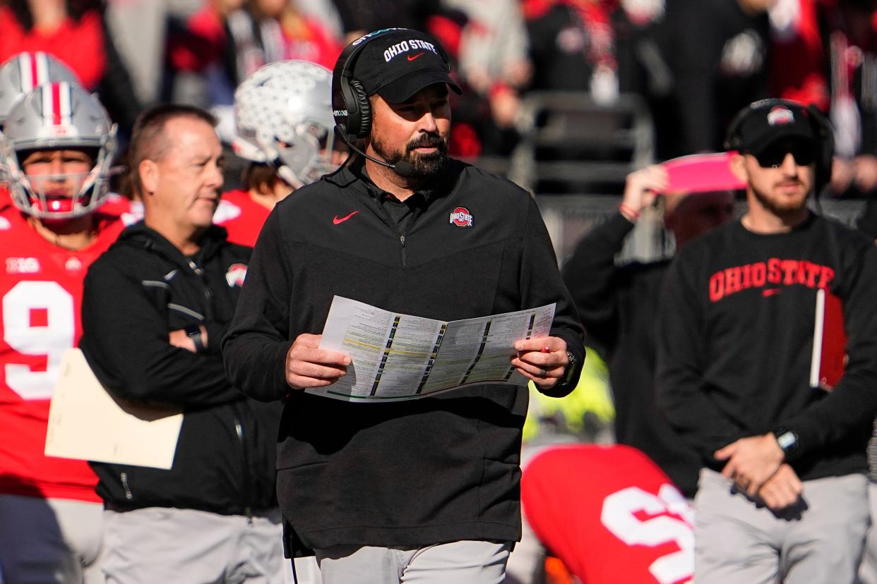 Nov 26, 2022; Columbus, Ohio, USA;  Ohio State Buckeyes head coach Ryan Day watches from the sideline during the first half of the NCAA football game against the Michigan Wolverines at Ohio Stadium. Mandatory Credit: Adam Cairns-The Columbus Dispatch