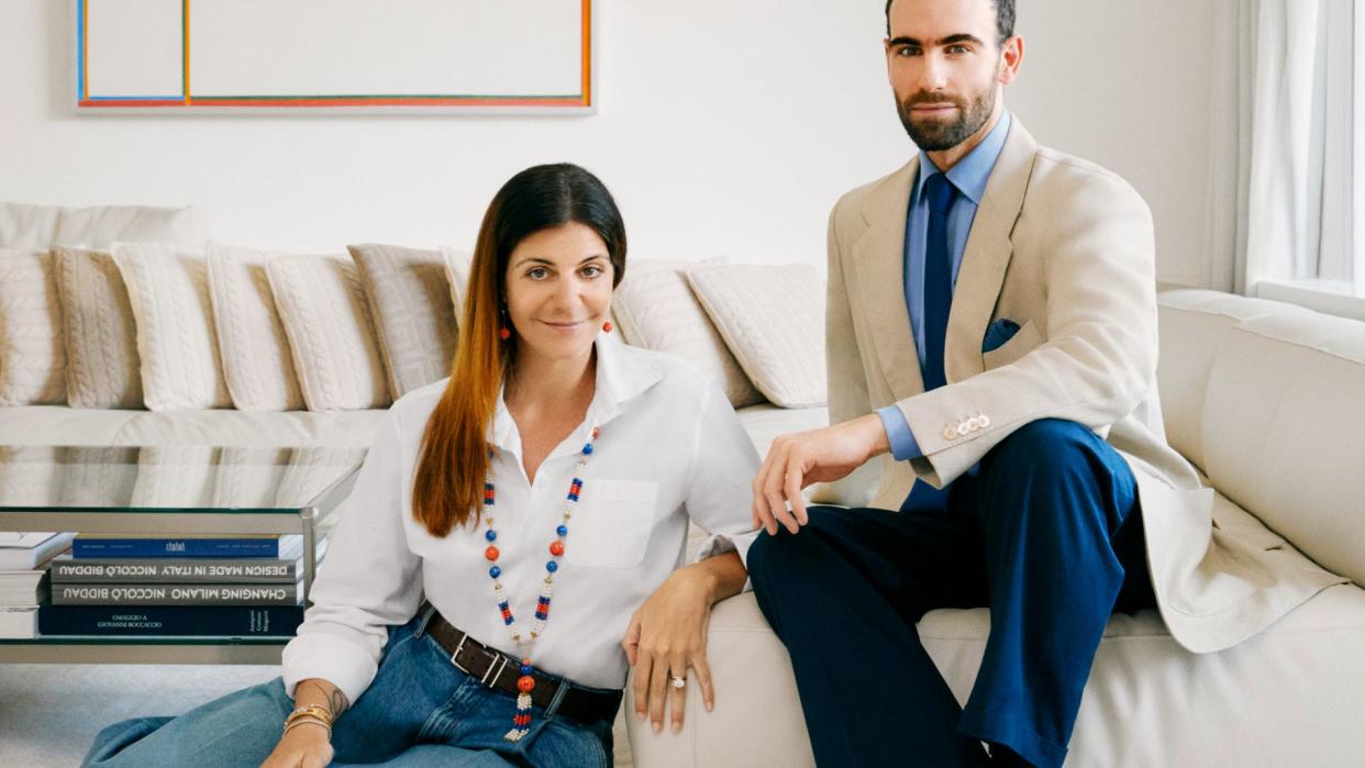 a man and a woman sitting on a couch