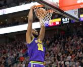 Dec 6, 2018; Salt Lake City, UT, USA; Utah Jazz forward Derrick Favors (15) dunks the ball during the first half against the Houston Rockets at Vivint Smart Home Arena. Russ Isabella-USA TODAY Sports