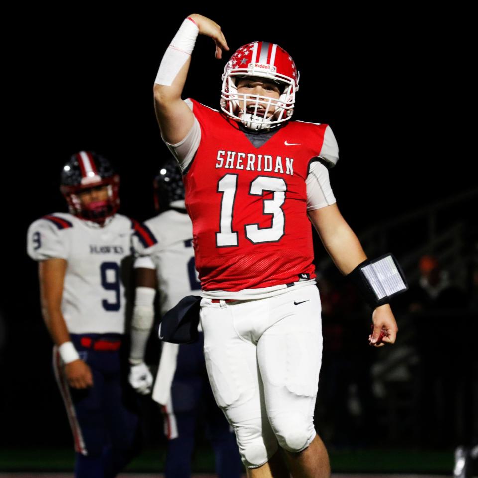 Caden Sheridan celebrates a touchdown during Sheridan's 34-27 win against Columbus Hartley in a Division IV, Region 15 semifinal on Nov. 10, 2023, at Newark's White Field. The senior quarterback has 2,465 total yards and 33 total touchdowns entering Friday's regional championship game with Steubenville.