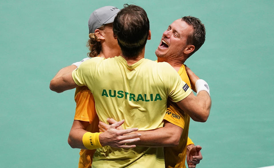 Lleyton Hewitt celebrates with Matt Ebden and Max Purcell after Australia advanced to the Davis Cup finals. (Photo by Martin Rickett/PA Images via Getty Images)