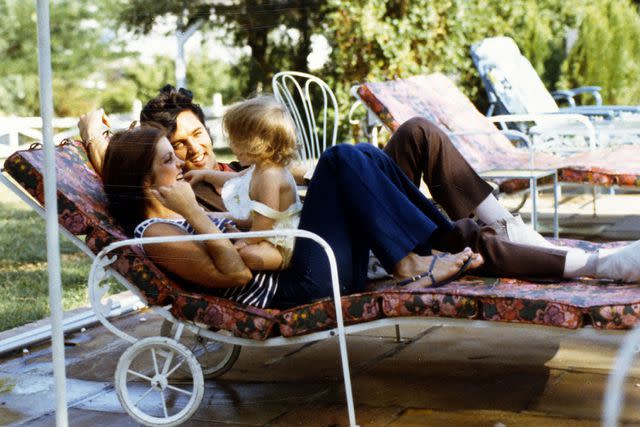 Magma Agency/WireImage Lisa Marie Presley as a child in Hawaii with her parents Elvis and Priscilla.