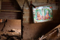 <p>A wall painting is seen on a wall of a room filled with debris and mud after a flash flood at Pentagon, in Freetown, Sierra Leone on Aug. 18, 2017. (Photo: Afolabi Sotunde/Reuters) </p>