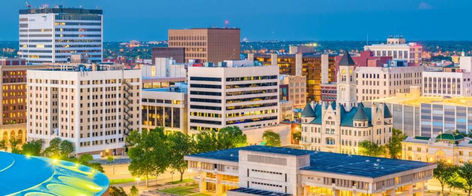 Wichita, Kansas, USA downtown skyline at dusk.