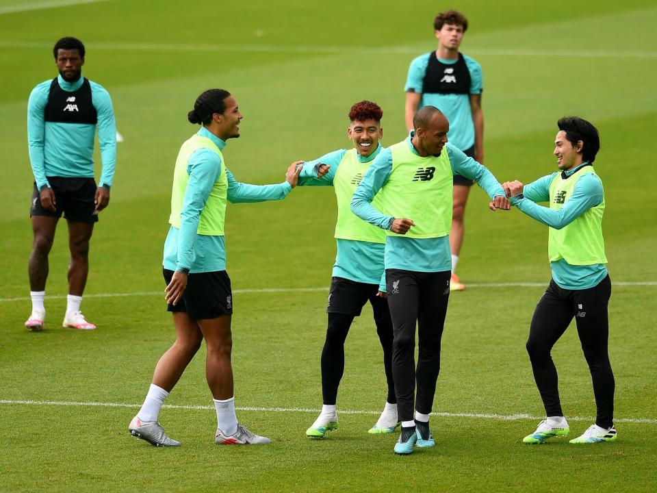 Virgil van Dijk, Roberto Firmino, Fabinho and Takumi Minamino of Liverpool during a training session: Liverpool FC via Getty Images