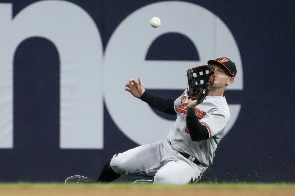 Baltimore Orioles' Austin Hays makes a sliding catch on a ball hit by Milwaukee Brewers' Joey Wiemer during the fourth inning of a baseball game Tuesday, June 6, 2023, in Milwaukee. (AP Photo/Morry Gash)