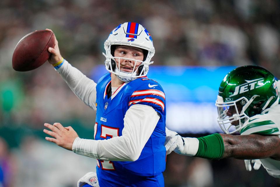 Buffalo Bills quarterback Josh Allen (17) scrambles during an NFL football game against the New York Jets on Monday, Sept. 11, 2023, in East Rutherford, N.J