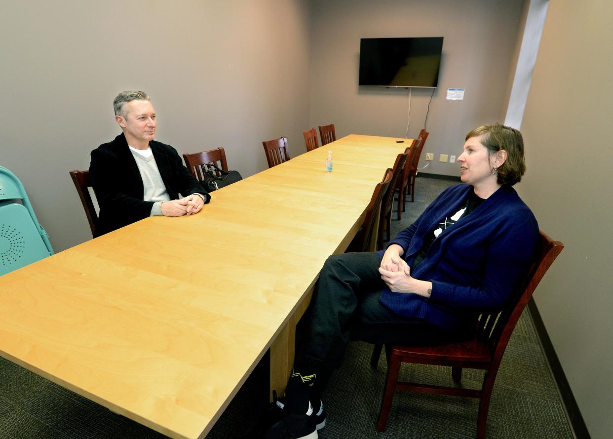 Business incubation coordinator Trisha Schlobohm, right, talks with new member John Baranzelli at the Innovate Springfield incubator on Tuesday Dec. 6, 2022. Innovate Springfield will move into the University of Illinois Springfield's new Innovation Center at Fourth and Washington in 2025.