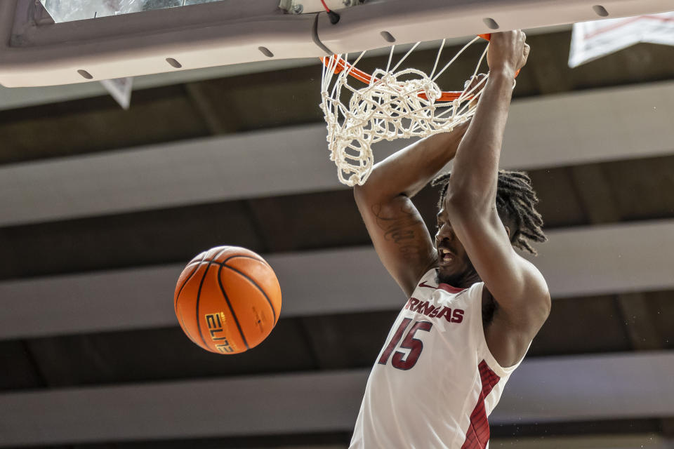 Arkansas forward Makhi Mitchell (15) dunks against Alabama during overtime in an NCAA college basketball game, Saturday, March 9, 2024, in Tuscaloosa, Ala. (AP Photo/Vasha Hunt)