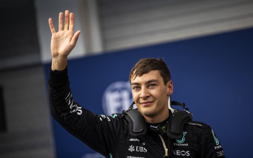 Pole position qualifier George Russell of Great Britain and Mercedes celebrates in parc ferme during qualifying ahead of the F1 Grand Prix of Hungary at Hungaroring on July 30, 2022 in Budapest, Hungary - Arpad Kurucz/Anadolu Agency via Getty Images