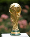 The FIFA 2026 World Cup soccer trophy is displayed Thursday, June 16, 2022, in New York. (AP Photo/Noah K. Murray)