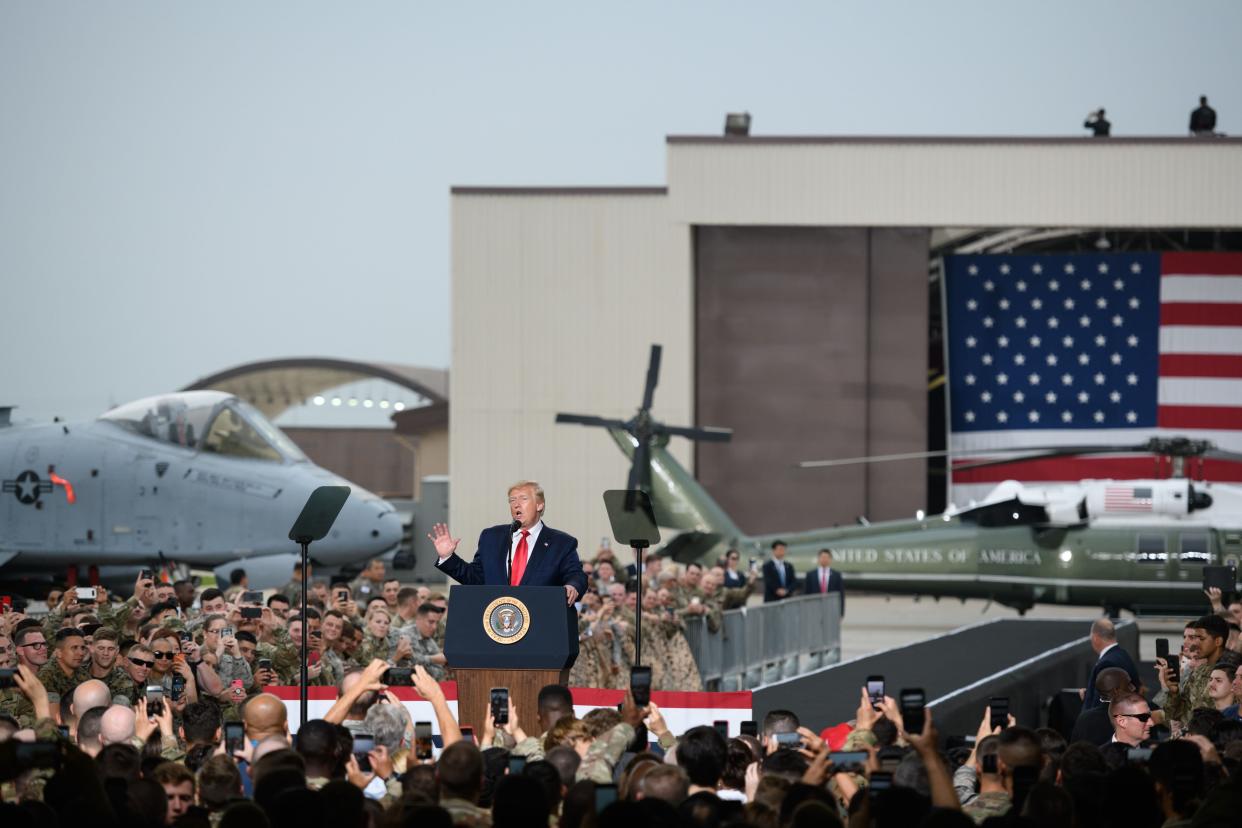 President Donald Trump speaks to military personnel and their families stationed in South Korea at Osan Air Base, south of Seoul, in June 2019. (Photo: ED JONES via Getty Images)