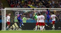 Soccer Football - World Cup - Group H - Poland vs Colombia - Kazan Arena, Kazan, Russia - June 24, 2018 Colombia's Yerry Mina scores their first goal REUTERS/Sergio Perez