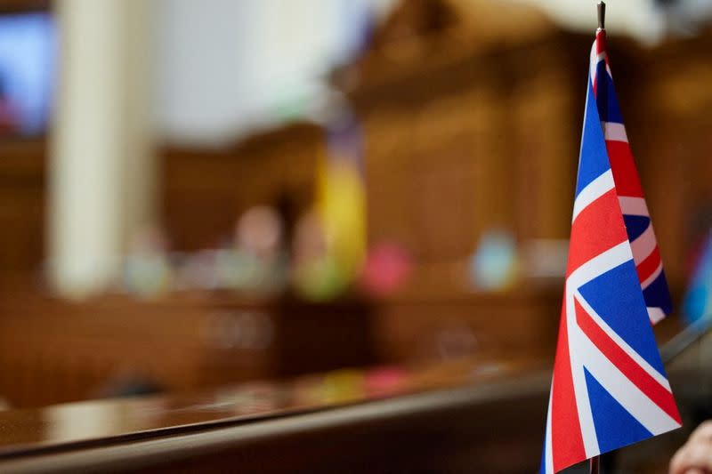 Ukraine's President Zelenskiy and British PM Johnson address a session of parliament, in Kyiv