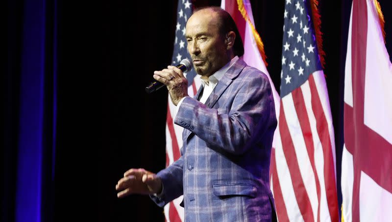 Artist Lee Greenwood sings before former President Donald Trump speaks at a fundraiser event for the Alabama GOP on Friday, Aug. 4, 2023, in Montgomery, Ala.