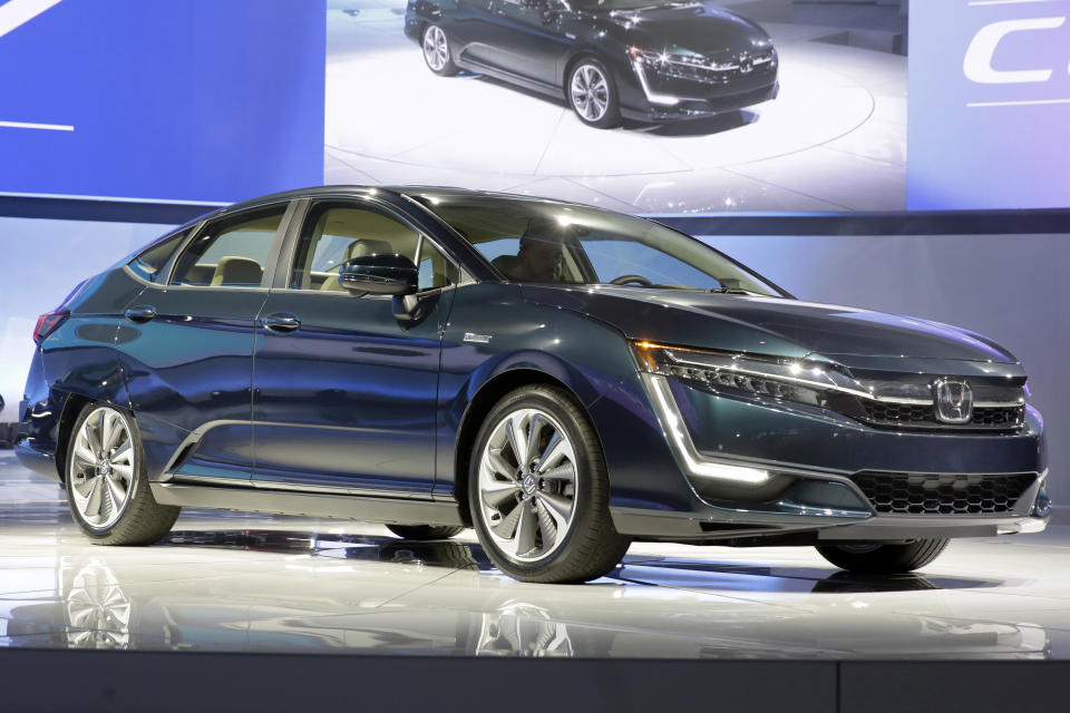 The hybrid model of the Honda Clarity is shown during a media preview at the New York International Auto Show, at the Jacob Javits Center in New York, Wednesday, April 12, 2017. (AP Photo/Richard Drew)