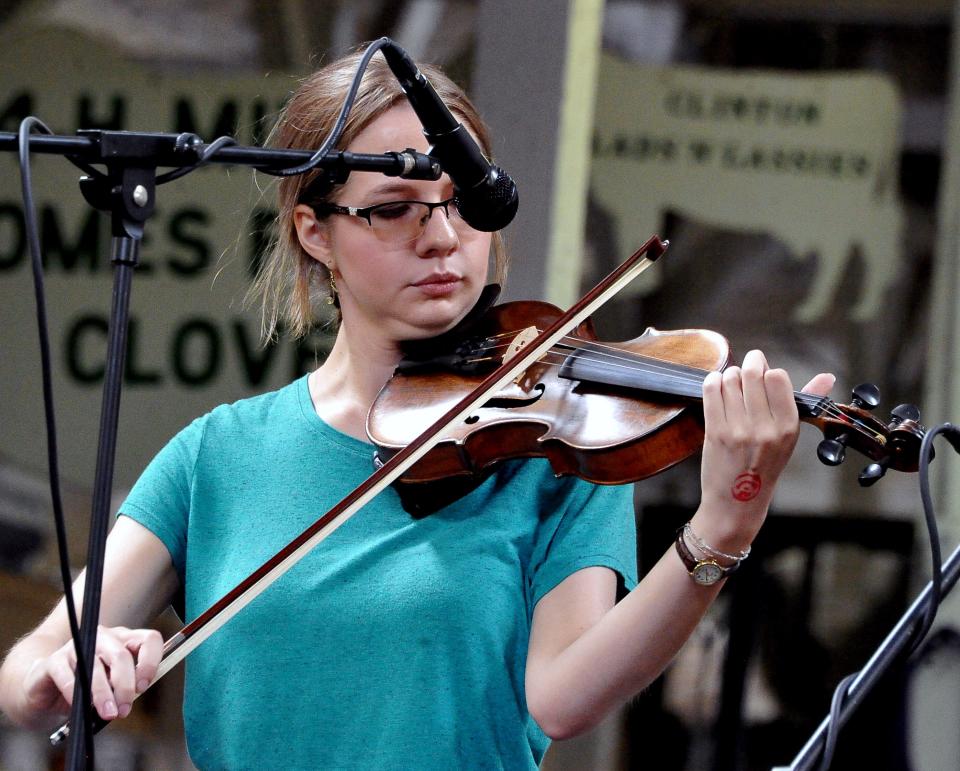 Nicole Tressler performs in the 13- to 18-year-old fiddling category at the Wayne County Fair.