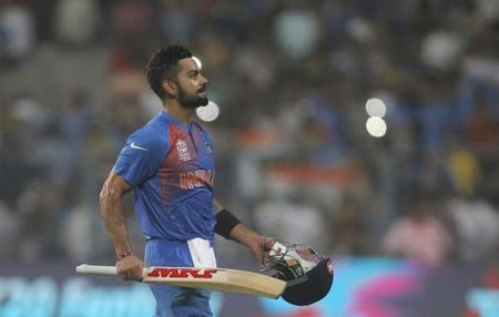 Cricket - India v Pakistan- World Twenty20 cricket tournament - Kolkata, 19/03/2016. Virat Kohli walks off the field after winning their match against Pakistan. REUTERS/Rupak De Chowdhuri