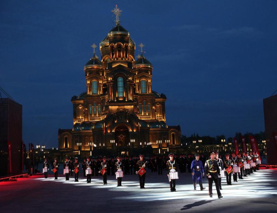 A Russian military band march in front of the cathedral during a military music festival in September.