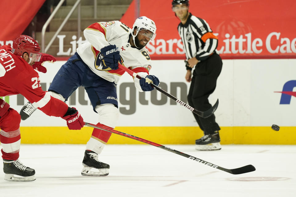 Florida Panthers left wing Anthony Duclair (91) shoots during the third period of an NHL hockey game against the Detroit Red Wings, Saturday, Jan. 30, 2021, in Detroit. (AP Photo/Carlos Osorio)