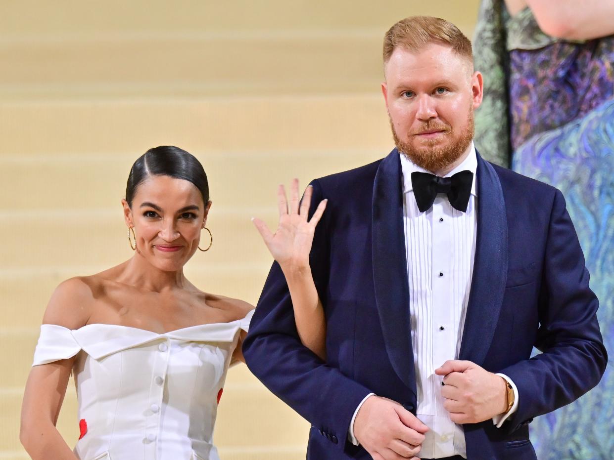 Alexandria Ocasio-Cortez and Riley Roberts leave the 2021 Met Gala in New York. 