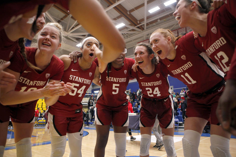 Stanford celebrates winning the championship over Mississippi State 67-62 at the Greater Victoria Invitational championship NCAA college basketball game in Victoria, British Columbia, Saturday, Nov. 30, 2019. (Chad Hipolito/The Canadian Press via AP)