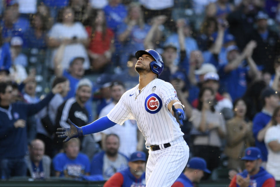 Chicago Cubs' Willson Contreras celebrates while running the bases after hitting a two-run home run during the first inning of the team's baseball game against the St. Louis Cardinals on Thursday, June 2, 2022, in Chicago. (AP Photo/Paul Beaty)