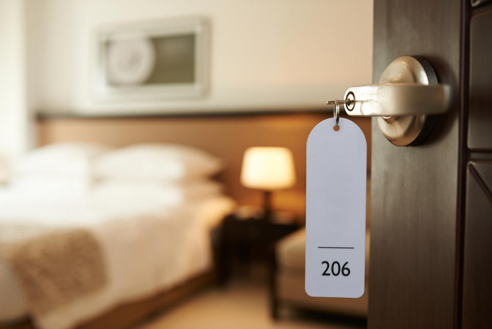 Door opening to a hotel room