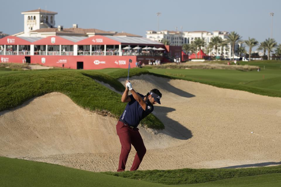 Antoine Rozner of France plays a bunker on the 18th hole during the third round of Abu Dhabi HSBC Golf Championship, in Abu Dhabi, United Arab Emirates, Saturday, Jan. 21, 2023. (AP Photo/Kamran Jebreili)