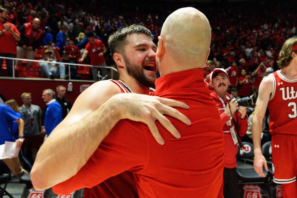 Utah Utes guard Rollie Worster (25) hugs Utah Utes head coach Craig Smith after their victory over rival Brigham Young University during a men’s basketball game at the Jon M. Huntsman Center in Salt Lake City on Saturday, Dec. 9, 2023. | Megan Nielsen, Deseret News