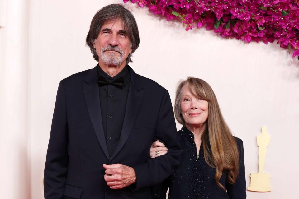 <p>Kevin Mazur/Getty</p> Jack Fisk and Sissy Spacek at the 2024 Oscars