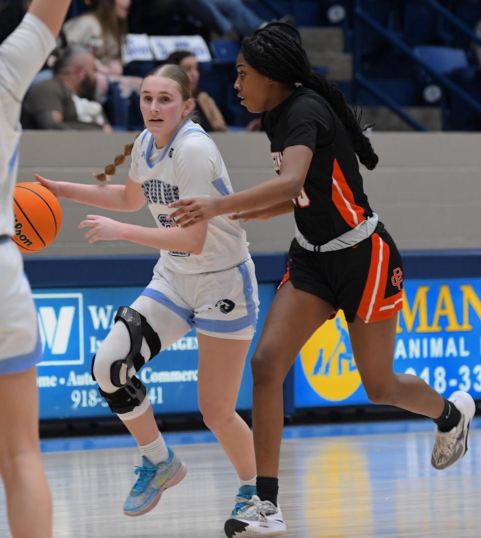 Bartlesville High School's Grace McPhail (2) moves the ball during basketball action against Putnam City in Bartlesville on Jan. 30, 2024. McPhail recently returned to the court after an injury and surgery that forced her to sit out the majority of her senior year.