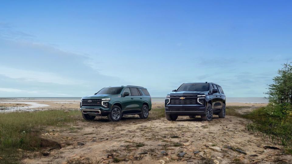 2025 chevrolet tahoe and suburban parked at the beach