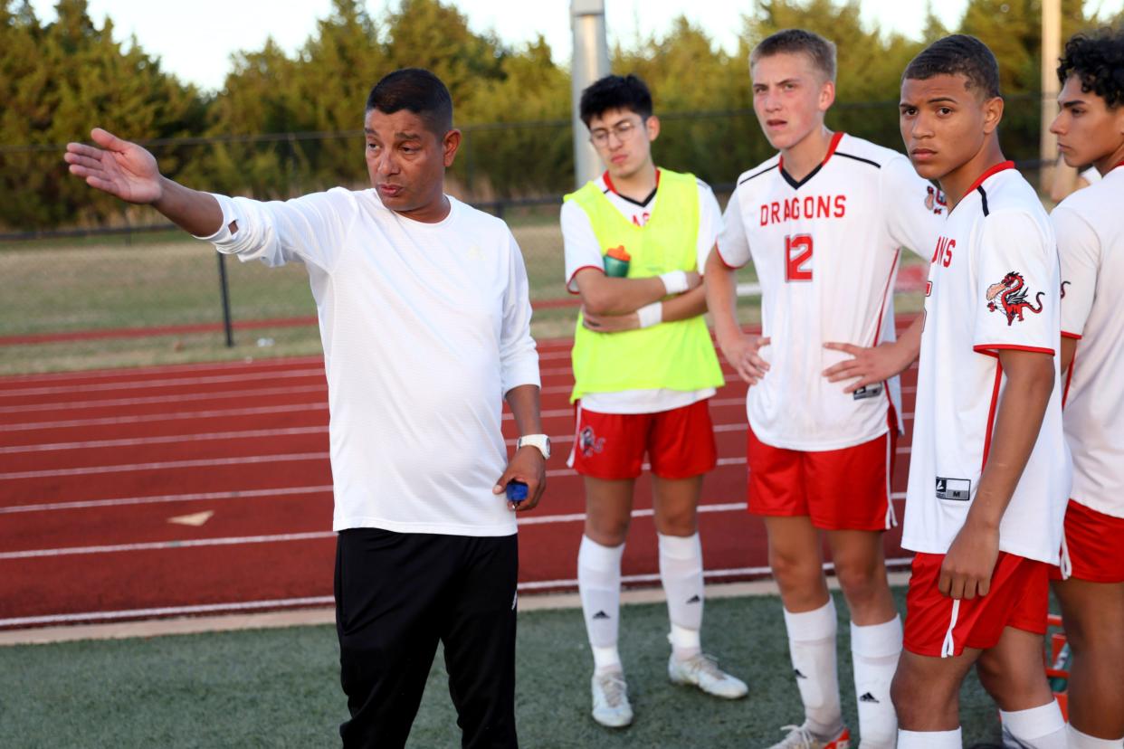 Boys soccer coach Diego DeLeon talks with the Purcell team during a boys soccer game against Crossings Christian in Oklahoma City, Tuesday, April 16, 2024.