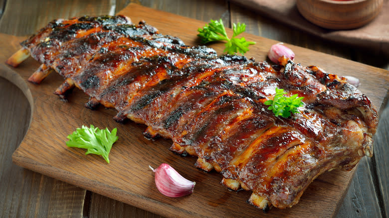 ribs on wooden cutting board 