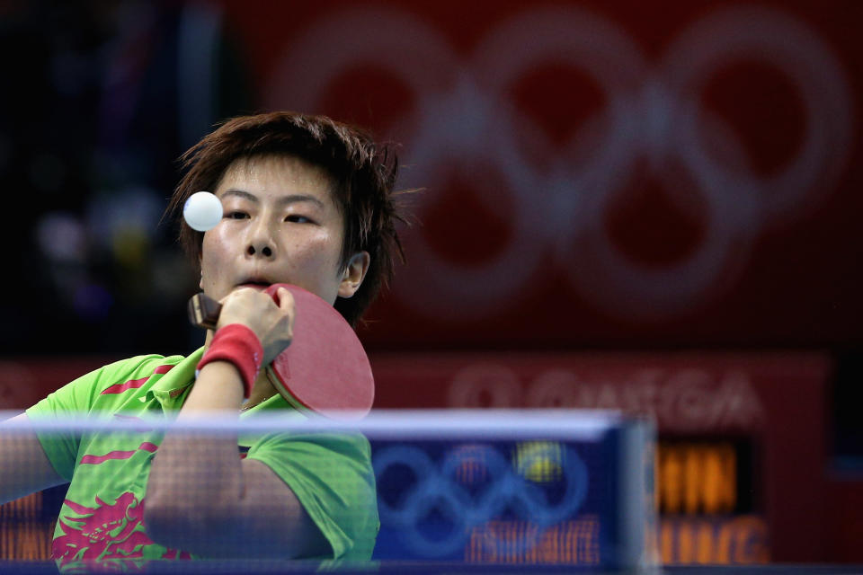 LONDON, ENGLAND - AUGUST 01: Ning Ding of China competes during her Women's Singles Table Tennis Gold Medal match against Xiaoxia Li of China on Day 5 of the London 2012 Olympic Games at ExCeL on August 1, 2012 in London, England. (Photo by Feng Li/Getty Images)